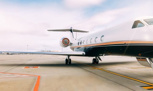 Private luxury jet at the airport terminal Private luxury jet at the airport terminal runway